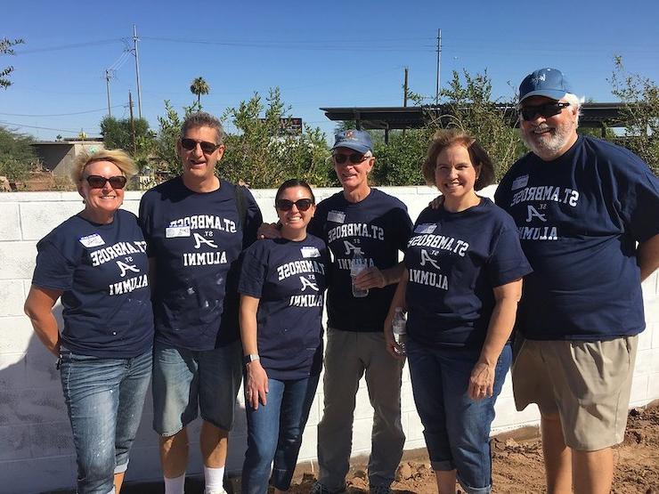 alums at service site